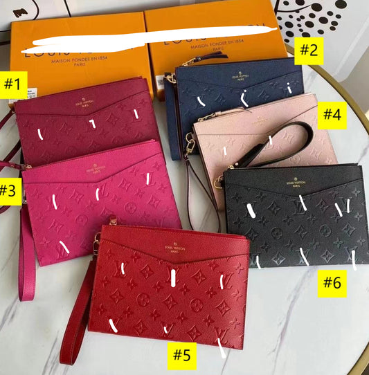 Vee wallet clutch