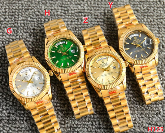 Gold R watch with box