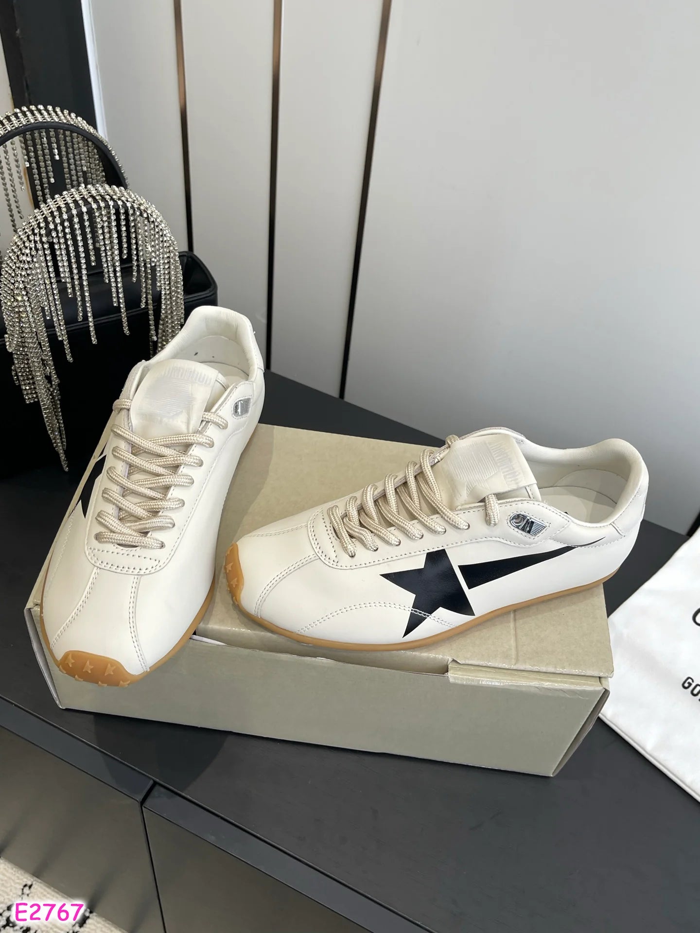 White  Golden G tennis shoe style