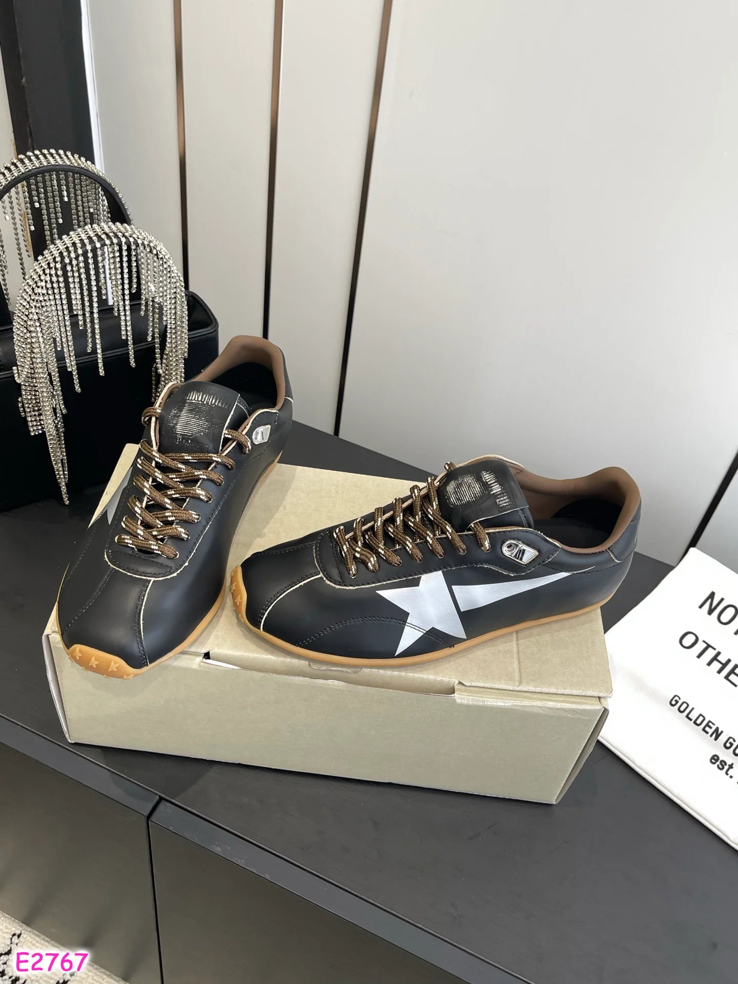 Black Golden G tennis shoe style
