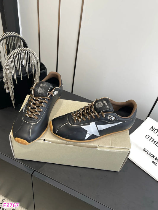 Black Golden G tennis shoe style