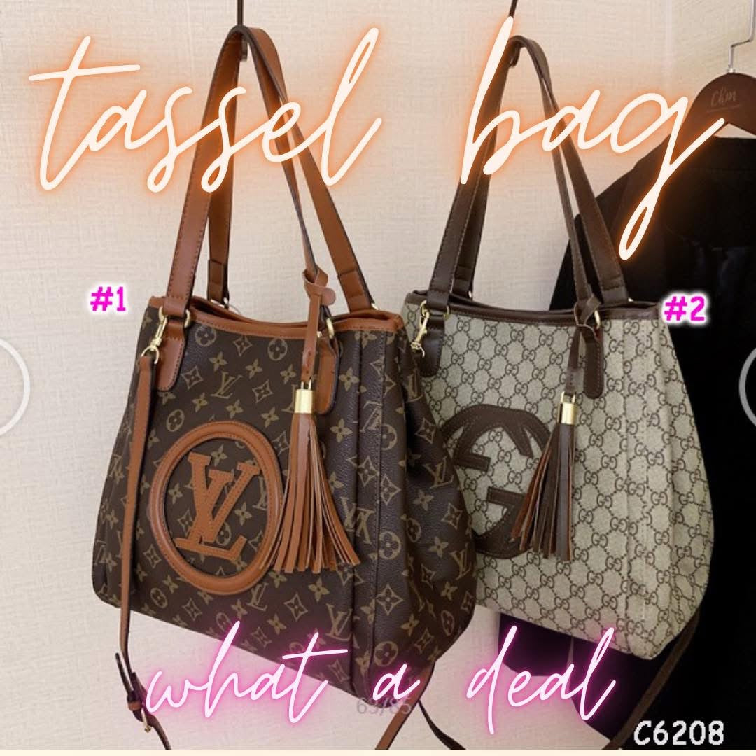 Tassle shoulder with long strap what a deal