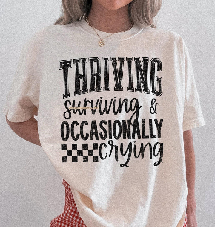 Thriving, surviving, crying ADULT TEE OR PULLOVER