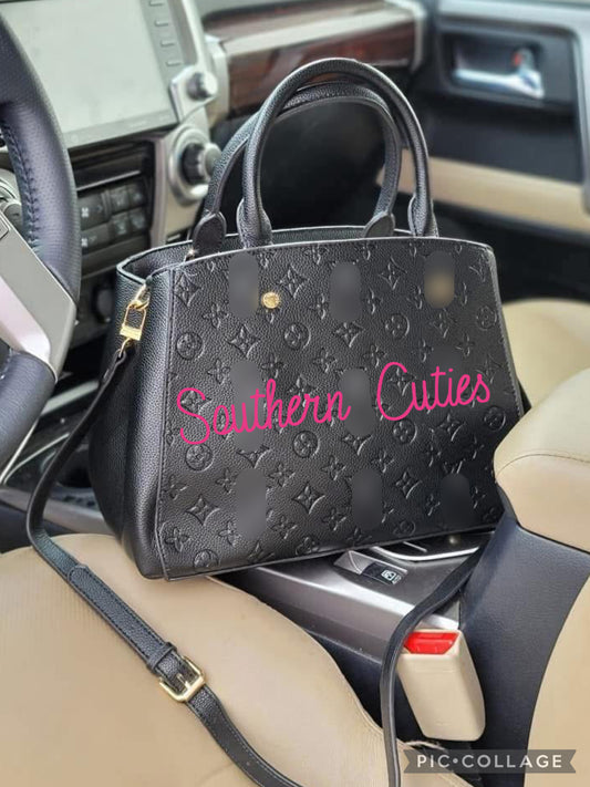 Full black leather Montaigne vee tote